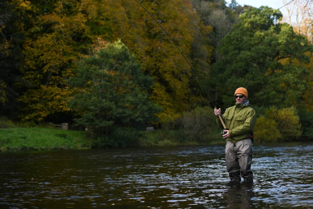 salmon-fisher-playing-salmon-river-tweed-hardy-fly-rod